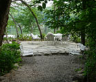 crushed stone pathway to flag stone patio