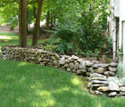 dry stack field stone wall landscape bed