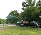 landscapers hydro seeding a Lawn